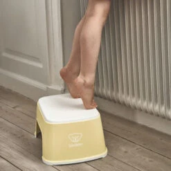 Babybjorn Step Stool -Motherswork Store babybjorn step stool powder yellow white 061266 002